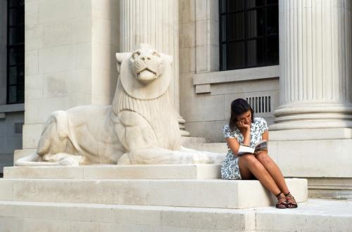 saturday_26th_may_2018_7.40pm_-_woman_reading_next_to_lion.jpg saturday_26th_may_2018_7.40pm_-_woman_reading_next_to_lion.jpg